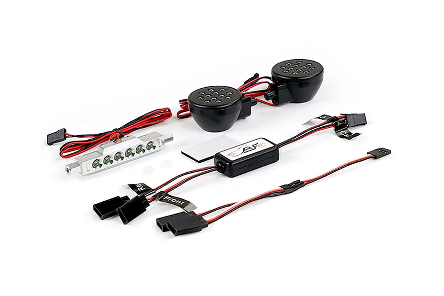Rovan RC light controller kit including a silver LED bar, two round black LED headlights, and a control module with wiring and connectors.