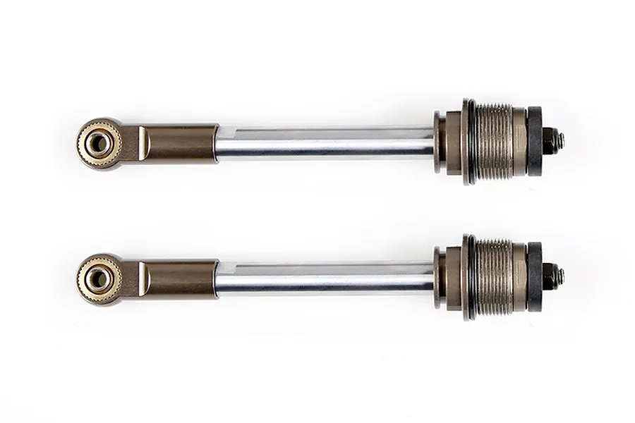Two Rovan RC shock absorber shafts with silver metal rods and brown anodized ends, laid horizontally against a white background.