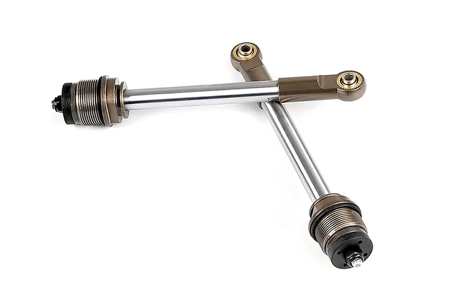 Two Rovan gun metal rear shock shafts with rod ends arranged in an X shape on a white background.