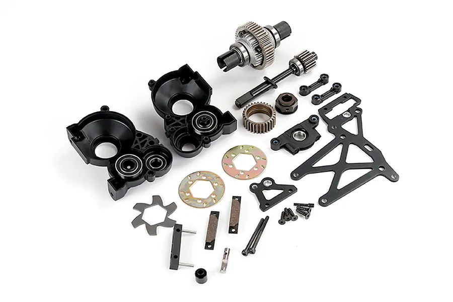 A Rovan 1/5 scale Baja plastic gear differential transmission assembly kit laid out on a white background.