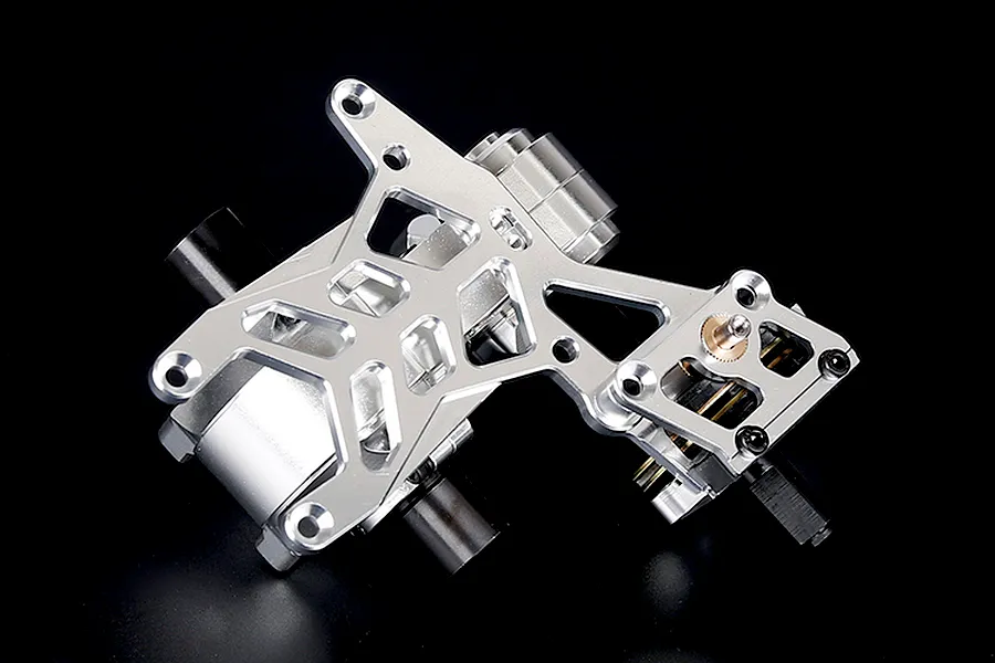 A silver aluminium gear differential transmission assembly for a 1/5 scale RC Baja vehicle, shown against a black background.