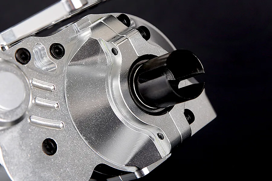 Close-up of a silver aluminium gear differential transmission assembly for a 1/5 scale RC car.