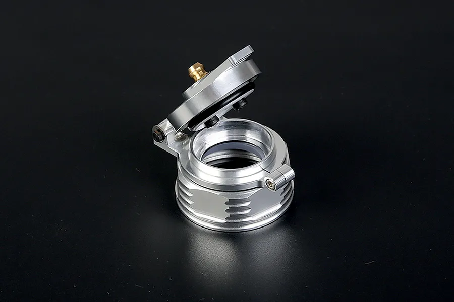 A silver Rovan aluminium leak-proof fuel tank cap for RC cars, shown in an open position against a dark background.