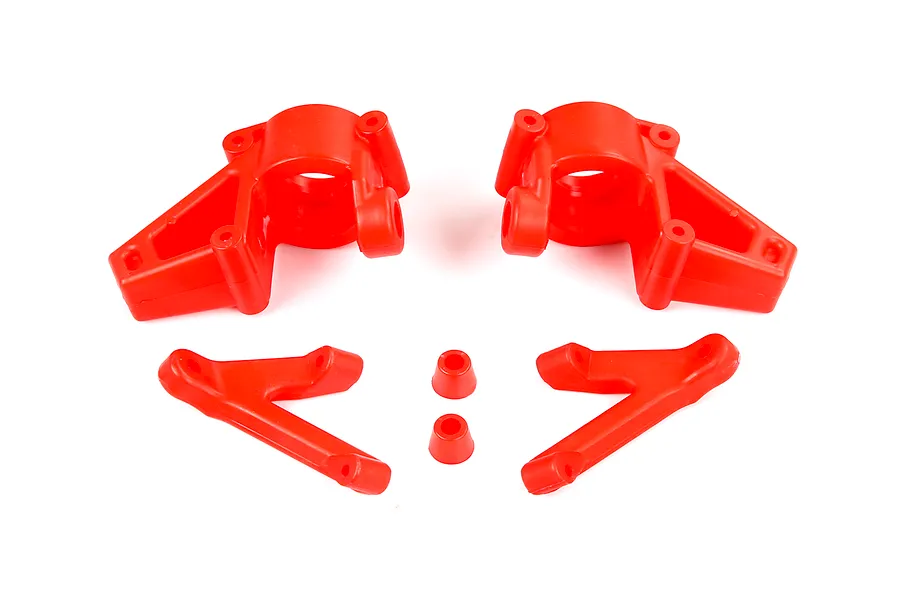A set of bright red nylon RC car front steering hubs and associated suspension arms on a white background.