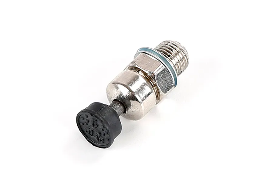 A Rovan Baja 71cc pressure reducing valve featuring a metallic threaded body and a black rubber push-button cap.