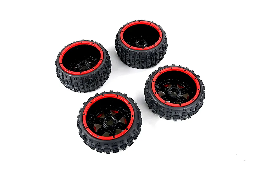 Four Rovan Baja 5B RC buggy wheels with black knobby tires and red beadlock-style rims arranged on a white background.
