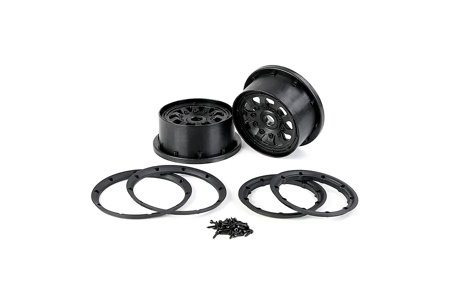 A set of black Rovan Generation 4 RC wheel hubs, including two main rims, four beadlock rings, and a small pile of mounting screws on a white background.