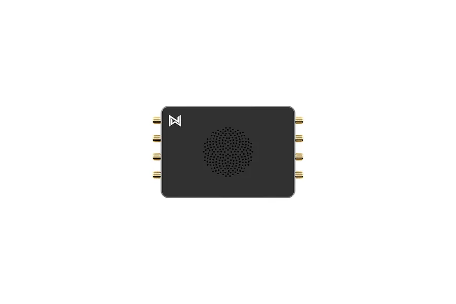 CaddxFPV Walksnail Avatar Video Repeater unit with a dark grey casing, gold antenna connectors, and a central circular ventilation grille.