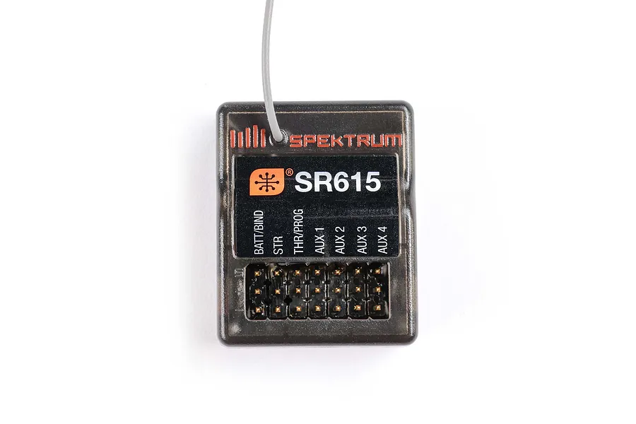 Top-down studio view of a Spektrum SR615 6-channel radio receiver on a white background, showing pins and antenna.