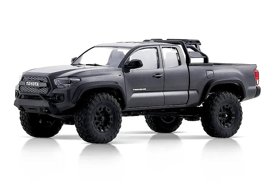 Grey FMS Toyota Tacoma 1/24 scale RC rock crawler studio product photo on a white background