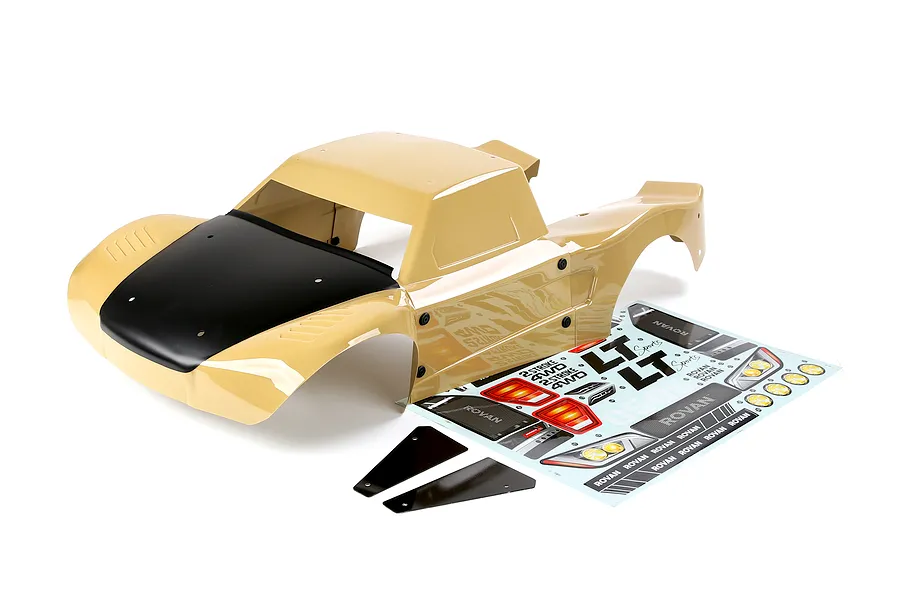 Rovan 1/5 LT painted short course body shell in tan with a black hood, accompanied by a decal sheet and two small black panels on a white background.