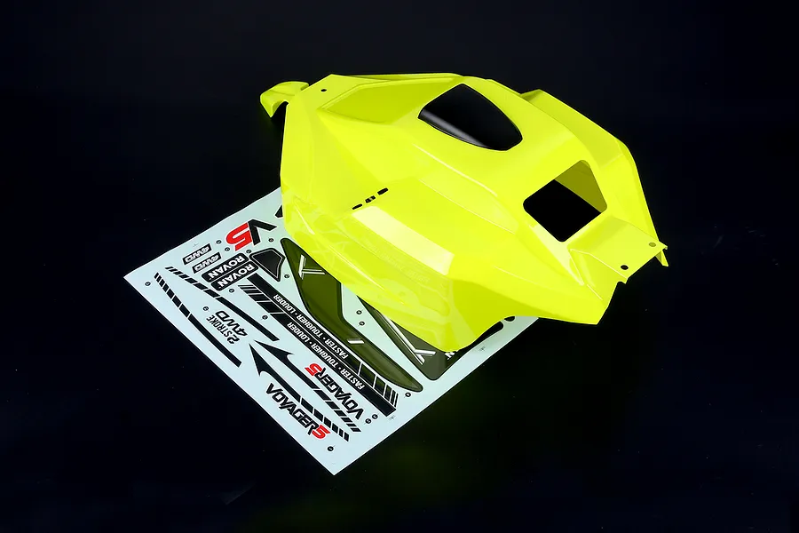 Rovan 1/5 V5 Buggy painted yellow body shell with an included sticker sheet on a dark background.