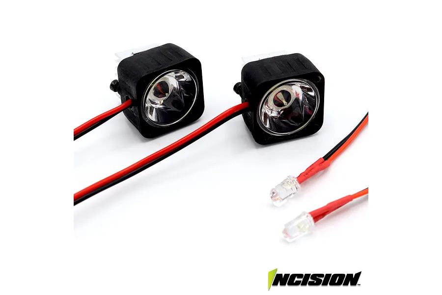 Two square LED light pods with black housings and red and black wires, alongside two smaller individual LEDs on a white background.