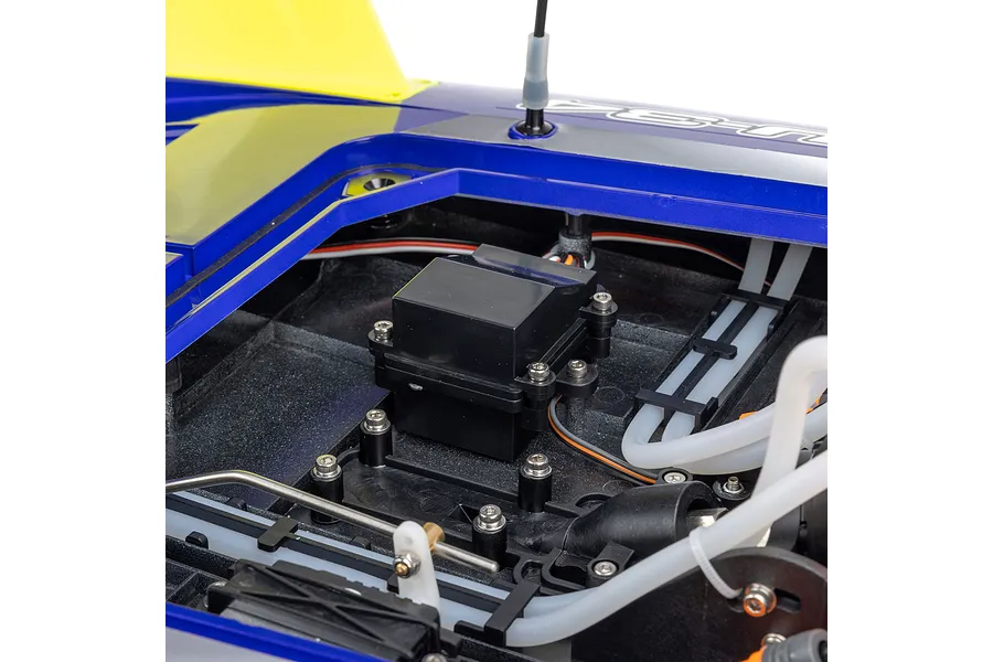 Close-up of the internal electronics compartment and receiver box inside the blue hull of the Pro Boat Miss Illinois RC boat.