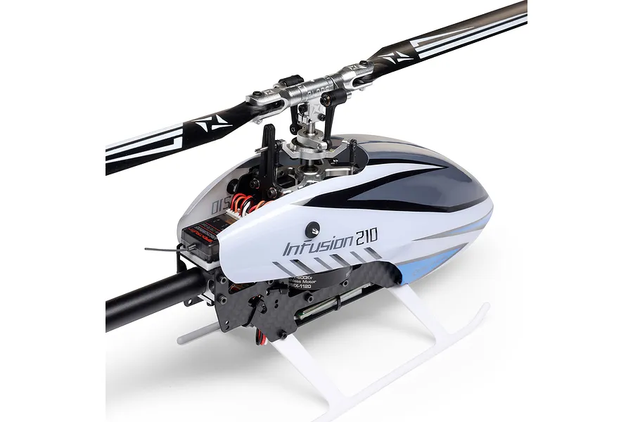 Close-up studio view of the Blade InFusion 210 RC helicopter main rotor head and fuselage with carbon fiber frame.