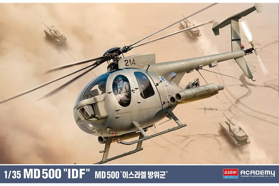 Box art for the Academy 1/35 MD 500 Defender helicopter model kit, showing an MD 500 helicopter flying over a desert landscape with tanks.