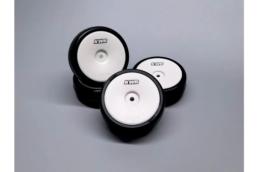 Set of four 1/10 scale RC car wheels featuring black rubber tyres mounted on white dish rims with KWR branding.