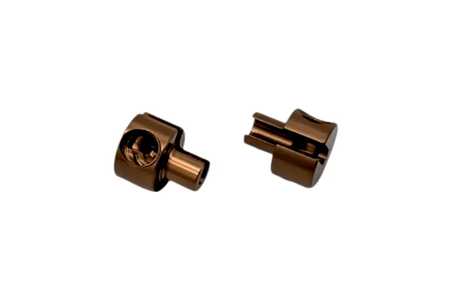 Two brown metallic RC Maker anti-roll bar collars shown isolated against a white background.