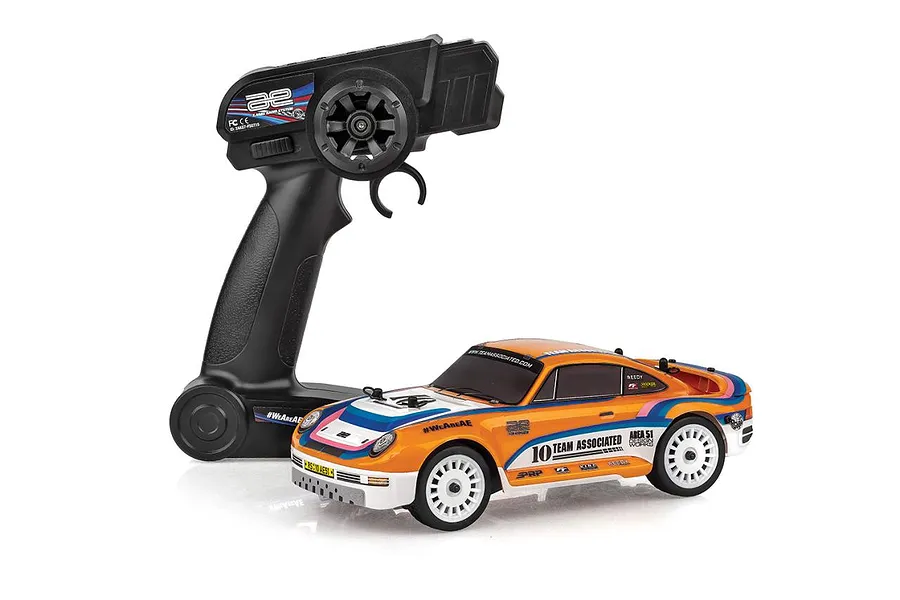 Team Associated RC24 Zoom RC rally car and black pistol-grip transmitter on a clean white background.