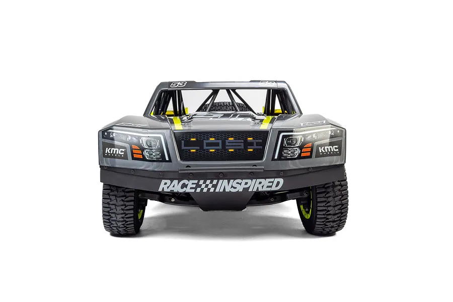 Front view of the Losi 5IVE-TG 3.0 1/5 Scale RC Short Course Truck in grey with KMC Wheels branding against a white background.