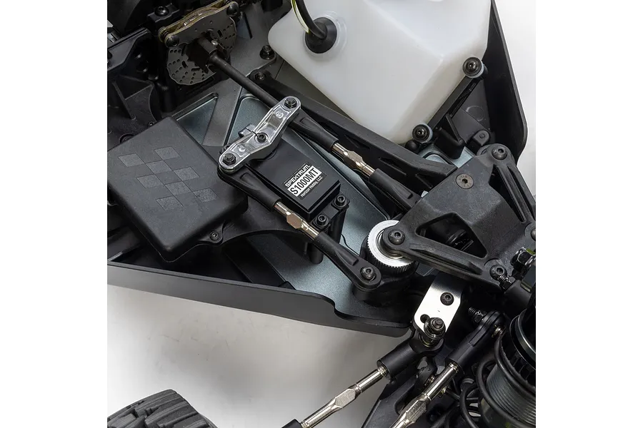 Top-down view of the internal chassis layout of the Losi 5IVE-T RC truck showing the Spektrum servo, linkages, and fuel tank.