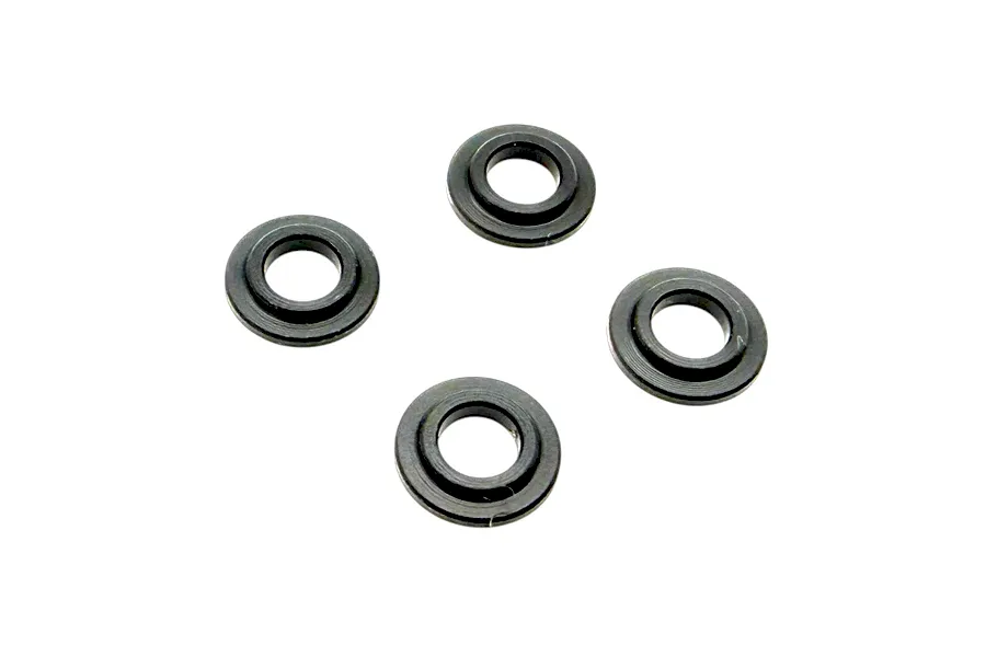 Four small black RC Maker shock shaft guides arranged on a plain white background.