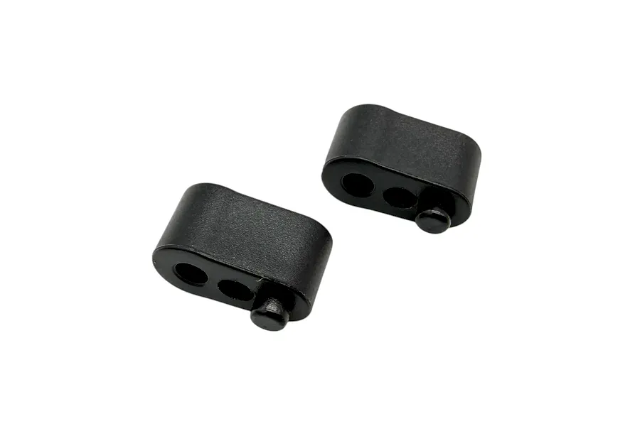 Two black RC Maker rear body mount spacers shown against a plain white background.