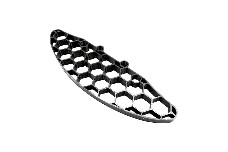 RC Maker black 3D honeycomb front bumper shown from an angled top-down perspective on a white background.