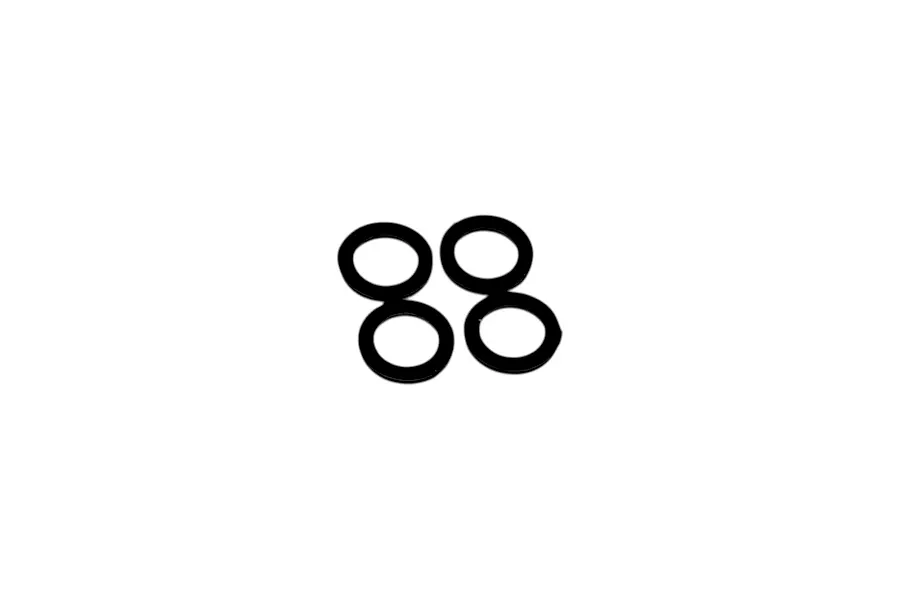 Four black nylon wheel hex washers displayed on a clean white background.