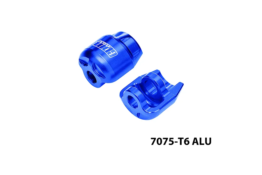 Two blue anodized aluminium shock cap protectors with machined details and branding text against a plain white background.