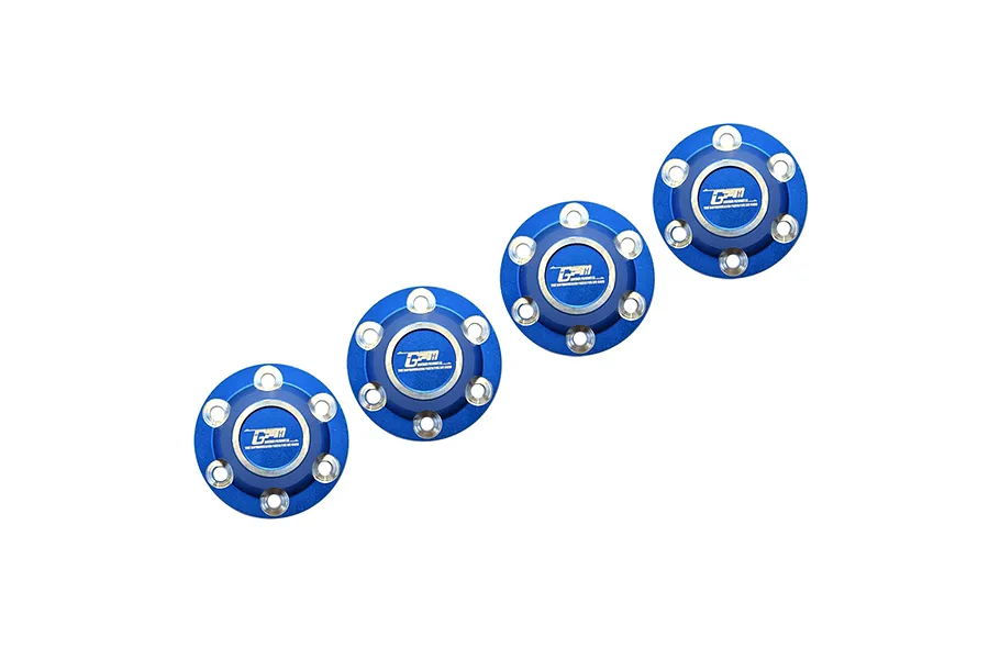 Four blue anodized aluminium wheel nuts with silver inlays and branding from GPM Racing arranged diagonally against a white background.