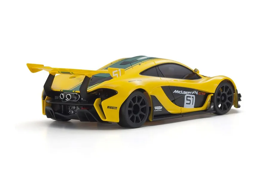 Rear three-quarter studio view of the yellow and green Kyosho Mini-Z McLaren P1 GTR RC car on a white background.