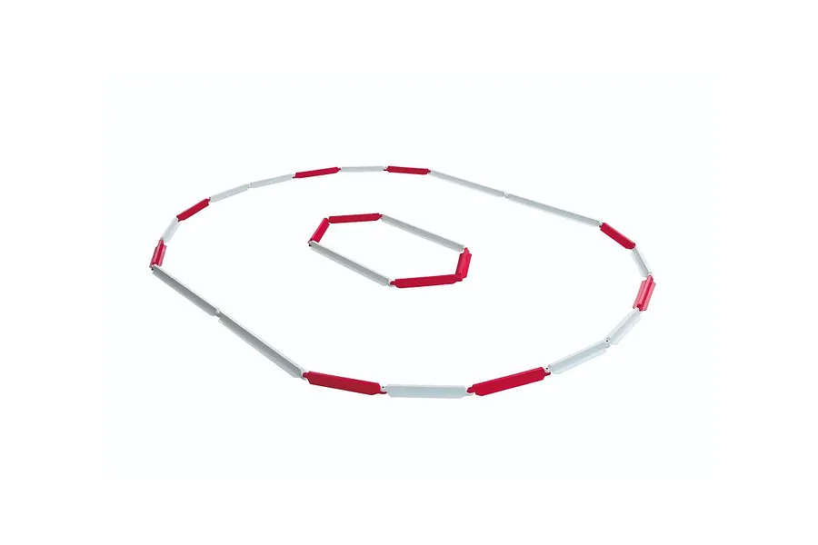 Kyosho Circuit Fence Set assembled into two oval track layouts against a clean white background.