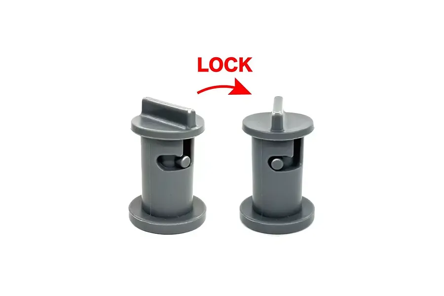 Close-up diagram of two gray plastic track locking pins demonstrating the lock mechanism with a red arrow and text.