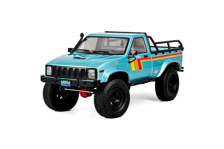 Light blue RGT Pioneer V2 Pro 1/10 scale 4WD RC rock crawler truck on a white background