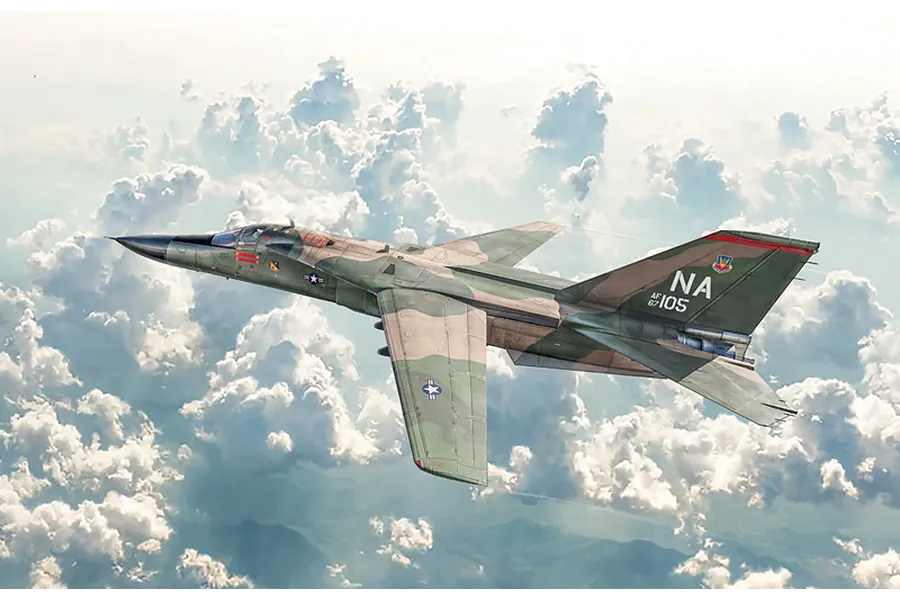 F-111A Aardvark jet fighter in camouflage flying above clouds.