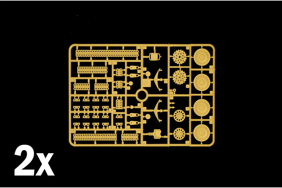 Tan plastic model kit sprue showing tank tracks, wheels, and suspension parts for the Italeri Jagdpanzer Hetzer model.