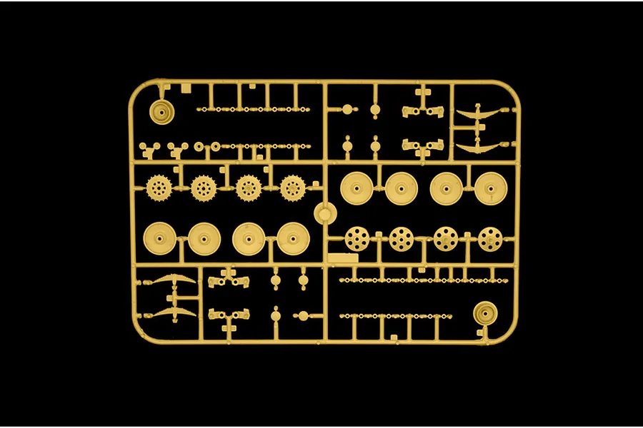 Tan plastic model sprue featuring various small parts, wheels, and suspension components for the Italeri Jagdpanzer 38(t) Hetzer model kit.