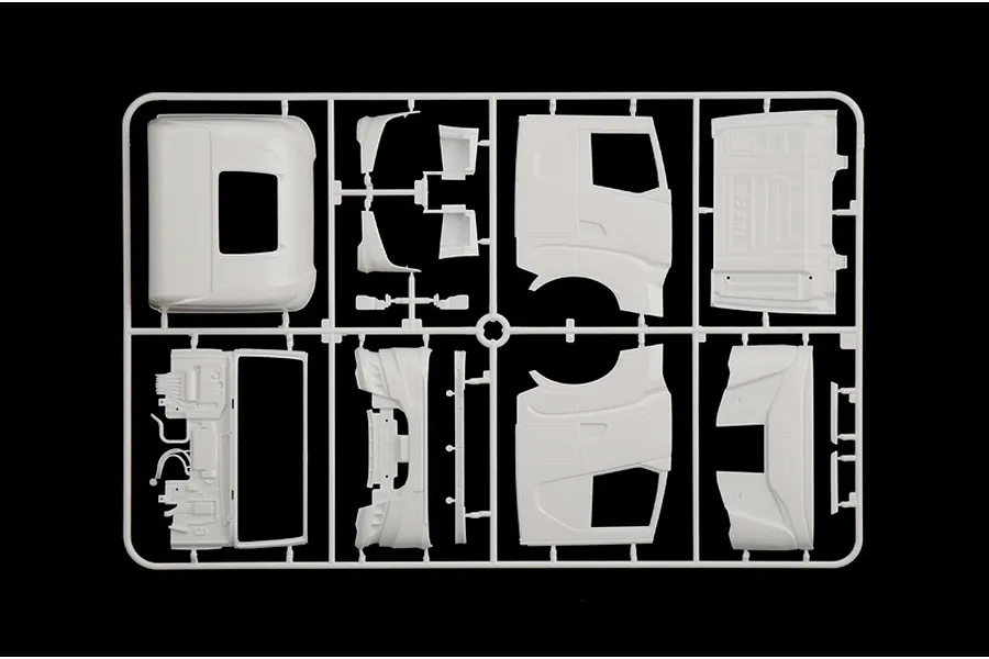 A white plastic model sprue featuring unpainted truck cab panels and parts for the Italeri Iveco S-Way model kit.