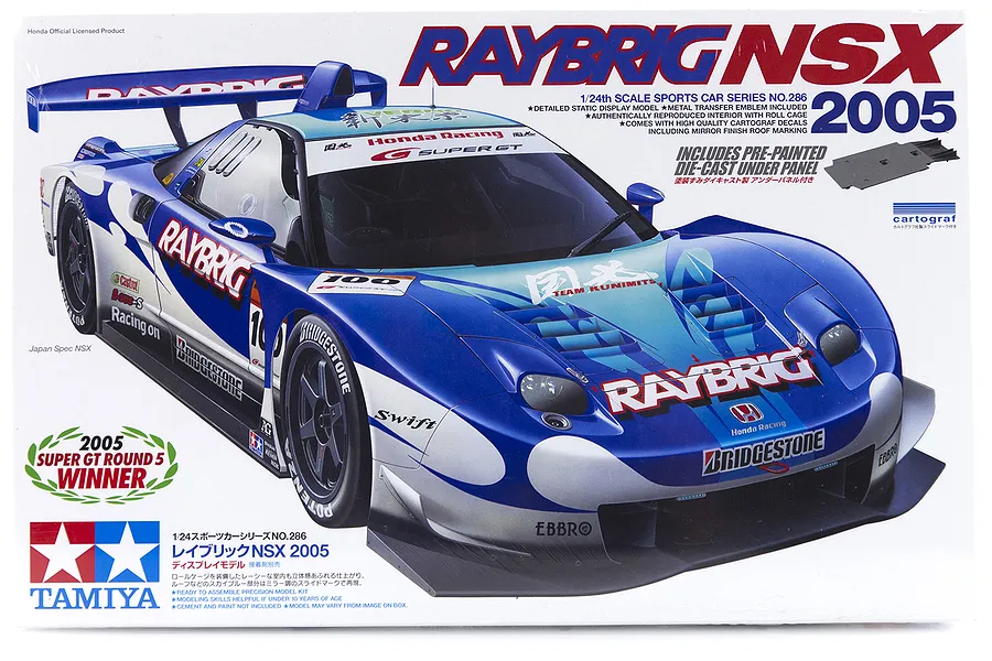 Tamiya 1/24 scale Honda NSX 2005 Raybrig plastic model kit box art showing the blue and white racing car.