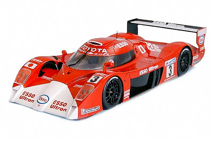 A fully assembled 1/24 scale Tamiya Toyota GT-One TS020 model car in red and white livery with Esso branding.
