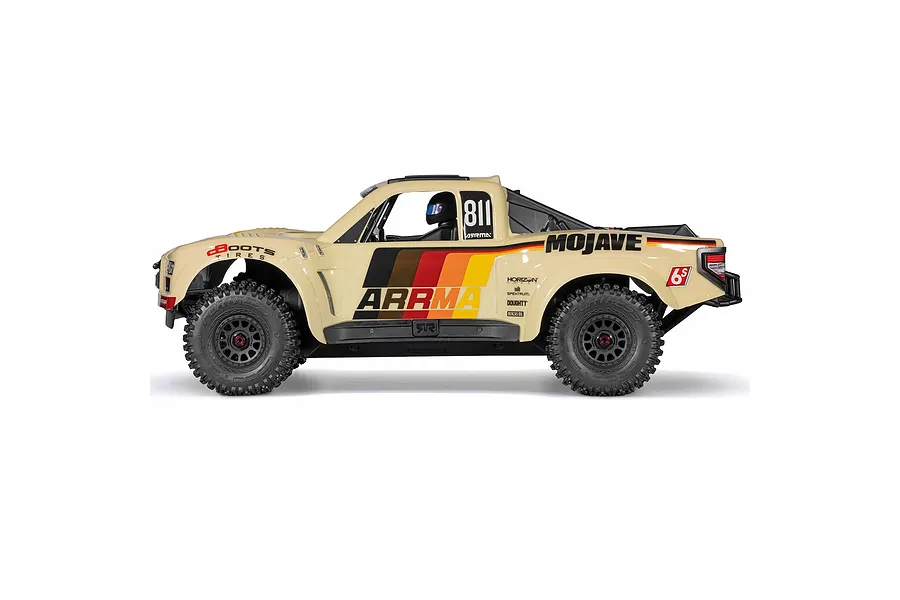 Studio side profile shot of the ARRMA MOJAVE 6S RC Short Course Truck in beige with retro racing livery.