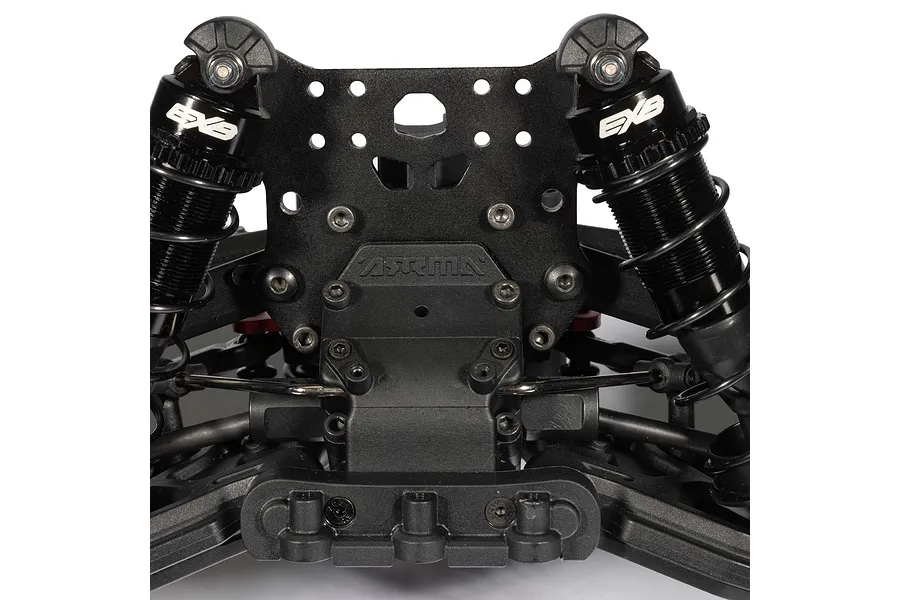 Close-up studio shot of the black aluminum shock tower and dual shocks on an ARRMA RC car.