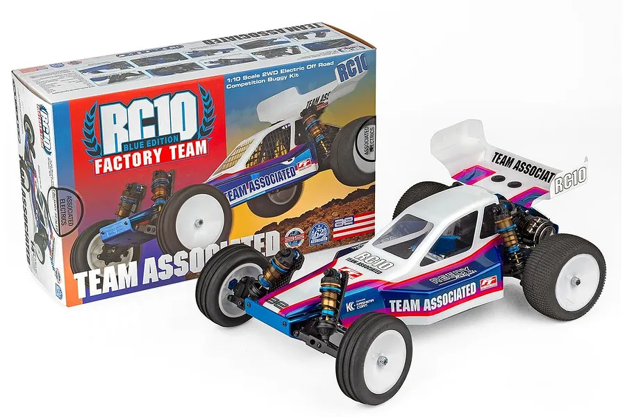 Team Associated RC10 Factory Team Blue Edition buggy kit assembled in front of its colourful product packaging.
