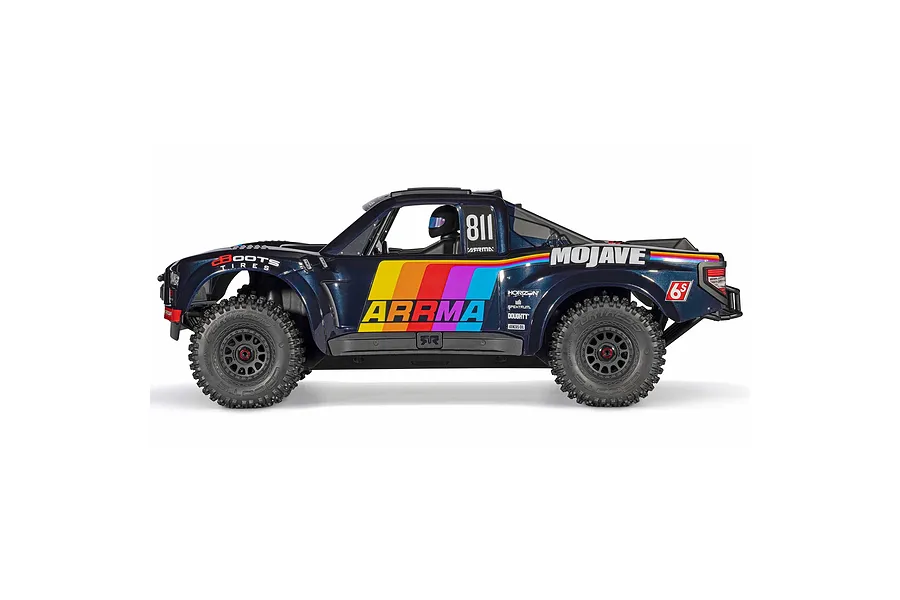 Studio side profile of the ARRMA Mojave 6S blue 1/7 scale RC short course truck against a white background.