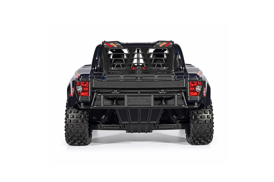 Rear view of the ARRMA MOJAVE 6S RC short course truck showing rear bumper, taillights, roll cage, and chunky tread tires against a white background.