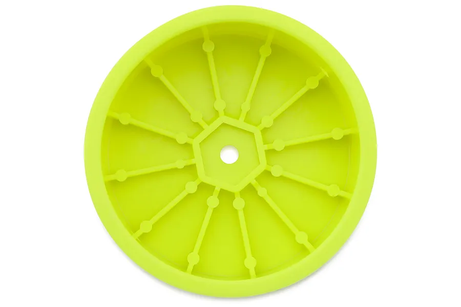 A single yellow RC buggy dish rim viewed from the inside, showing the central hex mount and reinforcing ribs against a plain white background.