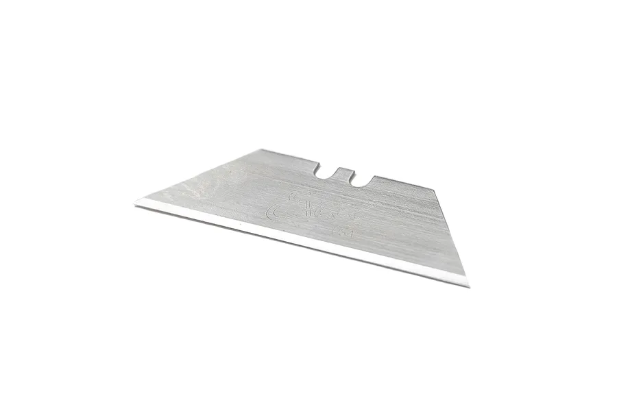 Single silver utility replacement blade with two notches lying flat on a plain white background.
