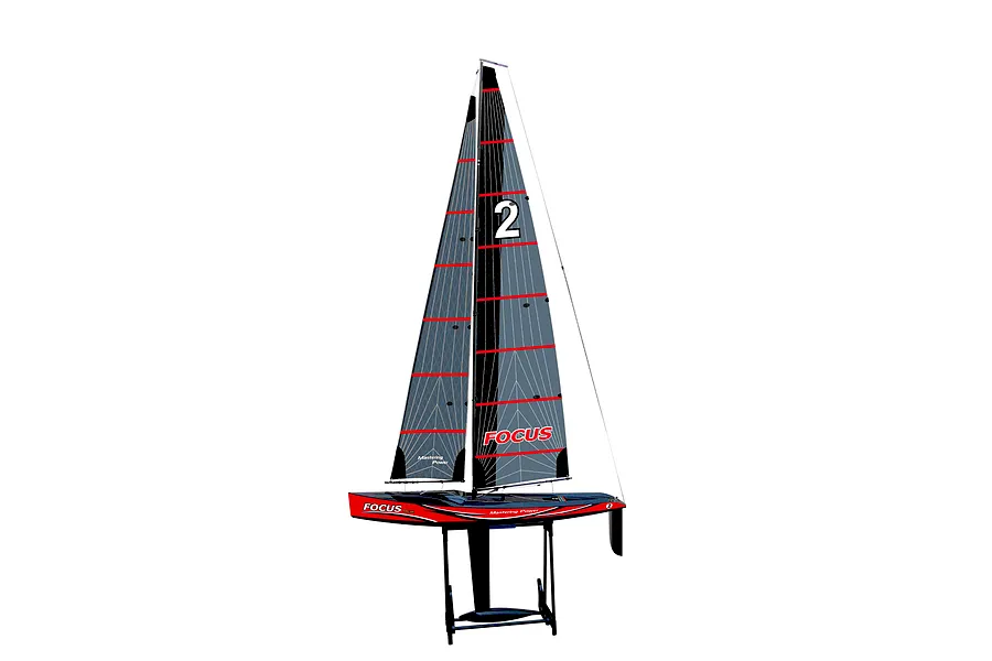 Studio shot of the Joysway Focus V3 red and black RC sail boat yacht on a display stand against a white background.