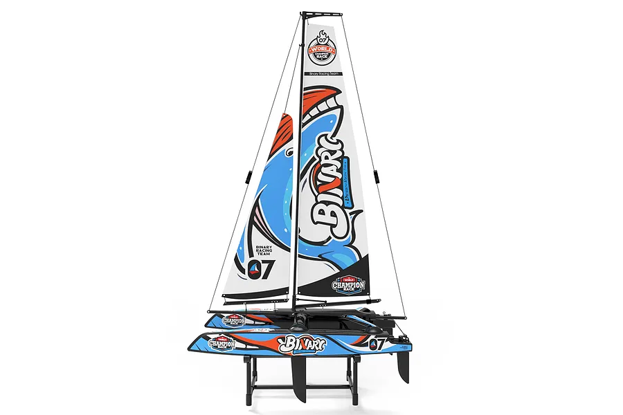 Joysway Binary V3 mini RC catamaran sailboat resting on a black display stand against a white background.